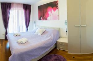 Postel nebo postele na pokoji v ubytování Dubrovnik Style Luxury Apartment