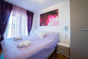 Postel nebo postele na pokoji v ubytování Dubrovnik Style Luxury Apartment