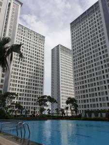 a view of tall buildings in a city at M-Town Residence Gading Serpong by J`s Luxury Apartment in Tangerang