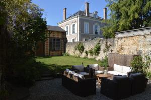 Posezení v ubytování Chambre d'Hôtes Les Ecuries