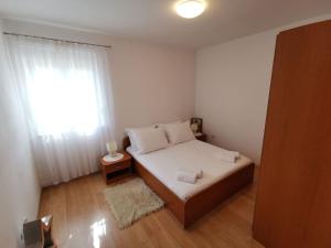 Postel nebo postele na pokoji v ubytování House MARIO