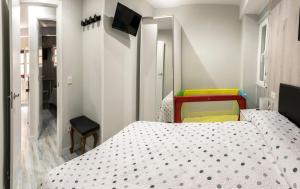A bed or beds in a room at Apartamento La Campanina