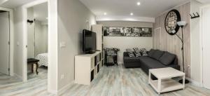 A television and/or entertainment centre at Apartamento La Campanina