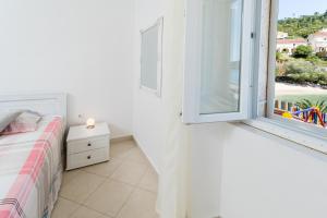 Postel nebo postele na pokoji v ubytování Royal Fortune