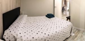 A bed or beds in a room at Apartamento La Campanina