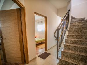 Ein Bett oder Betten in einem Zimmer der Unterkunft Apartment Renata
