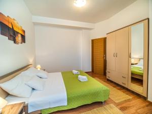 Ein Bett oder Betten in einem Zimmer der Unterkunft Apartment Renata