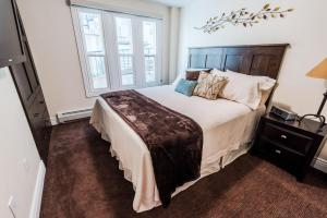 Ένα ή περισσότερα κρεβάτια σε δωμάτιο στο Prime Location EdelWeiss Luxury Condo