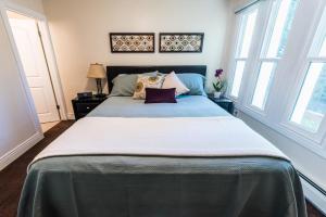 Ένα ή περισσότερα κρεβάτια σε δωμάτιο στο Prime Location EdelWeiss Luxury Condo