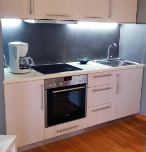 A kitchen or kitchenette at Pamela's house "private pool and spa"