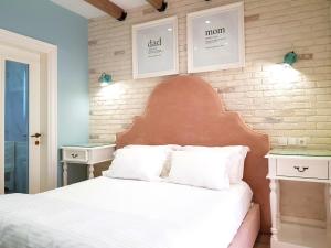 Katil atau katil-katil dalam bilik di Limani Luxury Apartments Beachfront