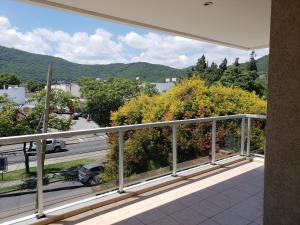 a balcony with a view of a street at Deluxe Reyes Católicos in Salta
