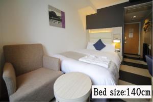 Postel nebo postele na pokoji v ubytování Hotel Sunroute Stellar Ueno