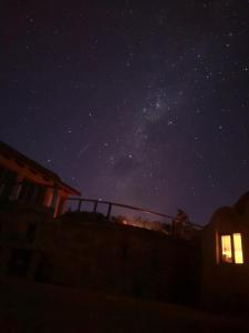a starry night with the milky way in the sky at Hostal Qhana Pacha in Isla de la Luna