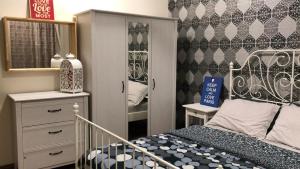 Postel nebo postele na pokoji v ubytování Bayu TAMARA RESIDENCE PUTRAJAYA