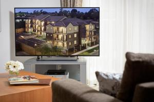 TV a/nebo společenská místnost v ubytování Ringwood Royale