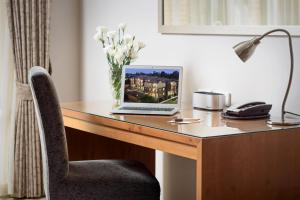 TV a/nebo společenská místnost v ubytování Ringwood Royale