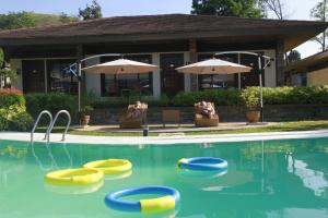 Bazén v ubytování Coron Soleil Express Hotel nebo v jeho okolí