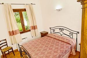 Säng eller sängar i ett rum på Monte Pirastru