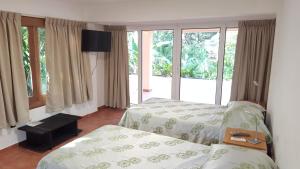 Voodi või voodid majutusasutuse Gamboa Apartment Toucan y Studio Ñeque toas