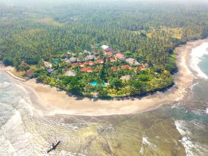 an aerial view of a resort on a beach at Puri Dajuma Beach Eco-Resort & Spa in Pulukan