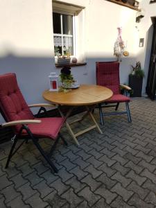 Ein Sitzbereich in der Unterkunft Ferienwohnung Itzgrundruhe