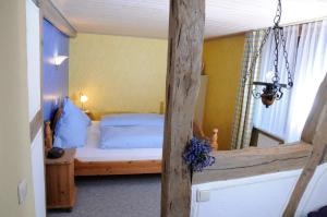 a bedroom with a bed in a room at Ferienhaus Stahlberg in Bacharach