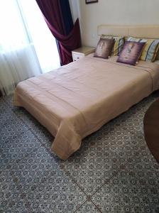 Postel nebo postele na pokoji v ubytování zhk Santorini + 37 fotografií