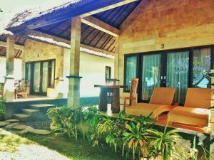 Zahrada ubytování Jemeluk Beach Bungalows