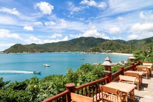 a view from a balcony overlooking the ocean at Santhiya Koh Phangan Resort and Spa - SHA Extra Plus in Thong Nai Pan Noi