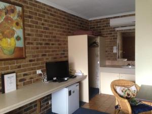 Kitchen o kitchenette sa Gisborne Motel