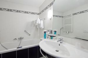 Koupelna v ubytování Van der Valk Hotel Leiden + 31 fotografií
