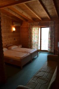 Postel nebo postele na pokoji v ubytování Hotel Adriatik 2