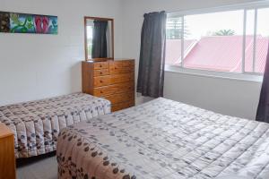 Postel nebo postele na pokoji v ubytování New Haven Motel
