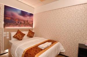 Whole Sunshine International Guest House 객실 침대