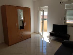TV a/nebo společenská místnost v ubytování Apartments Margita