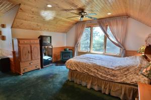Cama o camas de una habitación en Kenny Lodge Condo