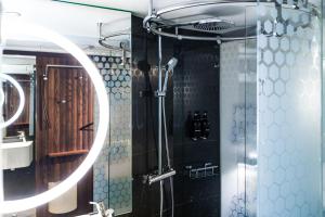 a bathroom with a shower and a sink at Best Western and hotel in Stockholm