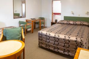 Postel nebo postele na pokoji v ubytování New Haven Motel