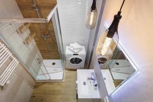 Koupelna v ubytování Apartments Tauron Arena Dąbska 19 & 21 by Renters