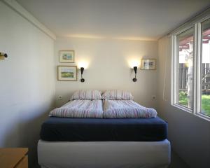 Letto o letti in una camera di Eric the Red Guesthouse