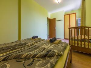 Posteľ alebo postele v izbe v ubytovaní BRUNO