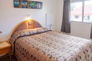 Postel nebo postele na pokoji v ubytování New Haven Motel
