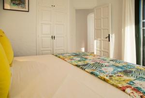 Ein Bett oder Betten in einem Zimmer der Unterkunft Torre Orquidaceae - Plus Costa Brava