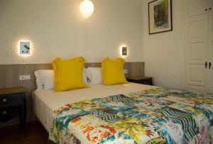 Ein Bett oder Betten in einem Zimmer der Unterkunft Torre Orquidaceae - Plus Costa Brava