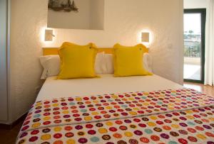 Ein Bett oder Betten in einem Zimmer der Unterkunft Torre Orquidaceae - Plus Costa Brava