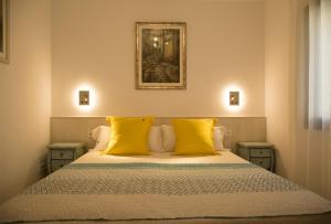 Ein Bett oder Betten in einem Zimmer der Unterkunft Torre Orquidaceae - Plus Costa Brava