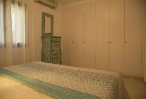Ein Bett oder Betten in einem Zimmer der Unterkunft Torre Orquidaceae - Plus Costa Brava