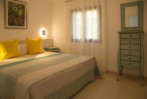 Ein Bett oder Betten in einem Zimmer der Unterkunft Torre Orquidaceae - Plus Costa Brava