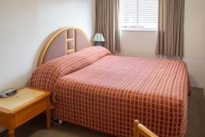 Postel nebo postele na pokoji v ubytování New Haven Motel